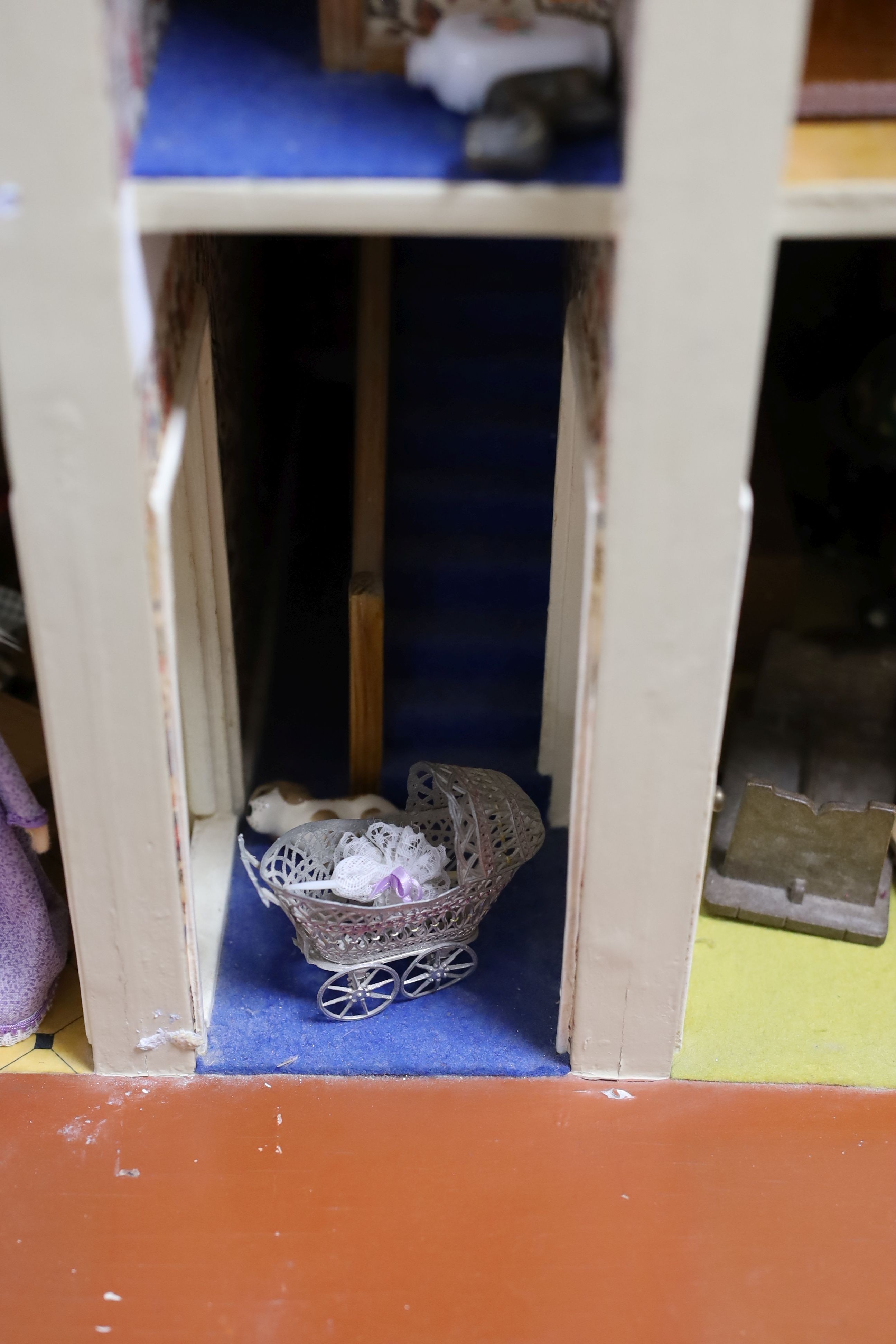A dolls house, length 74cm, depth 39cm, height 66cm